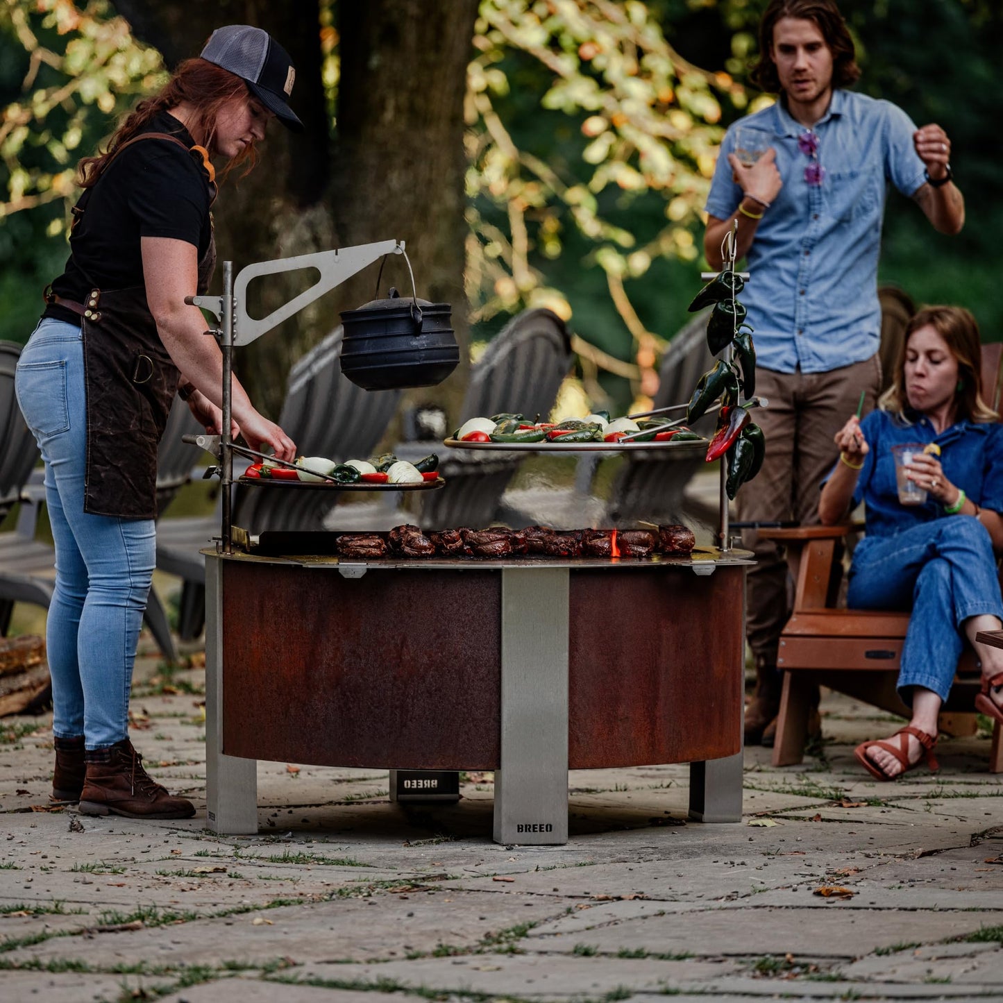 Breeo Smokeless FIrePit (X Series 42, Corten Steel, Lid Included) | 46 inch Smokeless Fire Pit for Outside | 190 Pounds | Ideal for Large GatheringsCompatible with Wide Range of Breeo Accessories