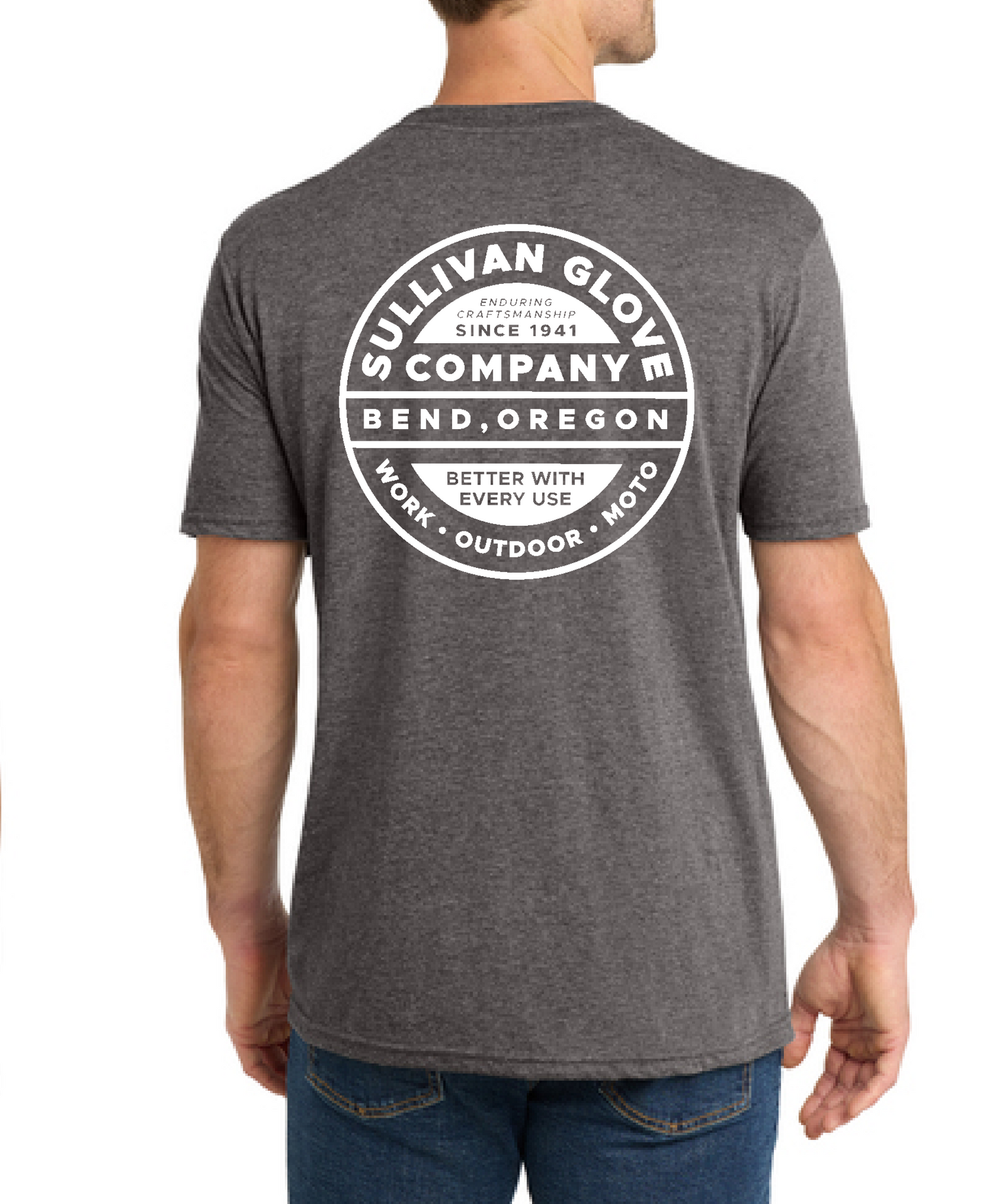 A man wearing a US made t-shirt printed in bend oregon showing a view from behind he's wearing blue jeans