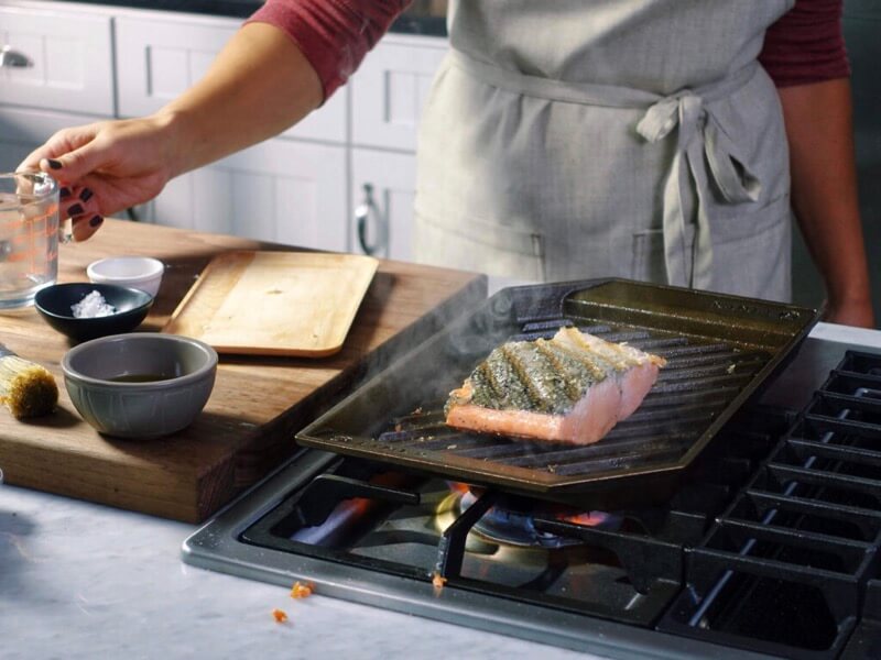 Cast iron grill pan with salmon