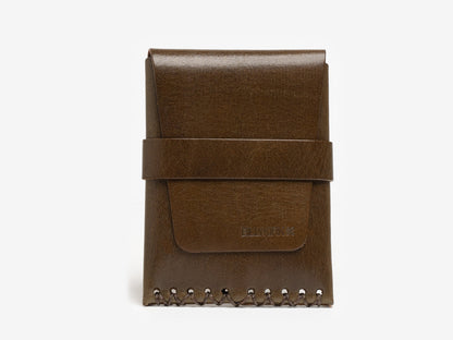 An olive leather wallet with a flap closure, horizontal strap, and visible stitching along the bottom edge, set against a plain white background.