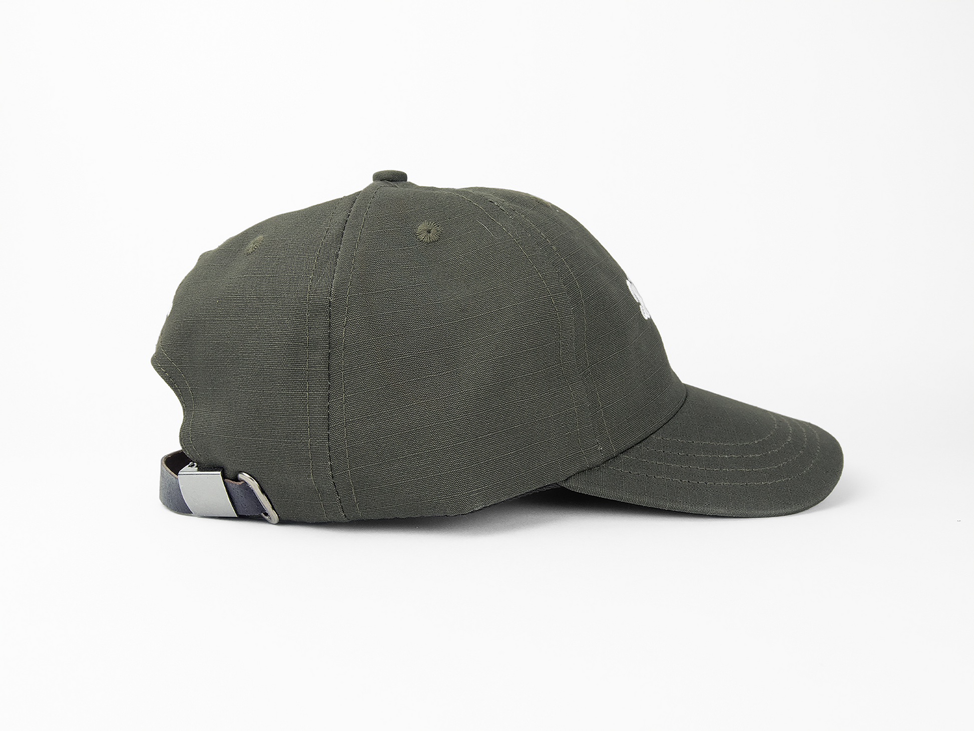 A side view of an olive baseball cap showing a leather closure and nickel hardware