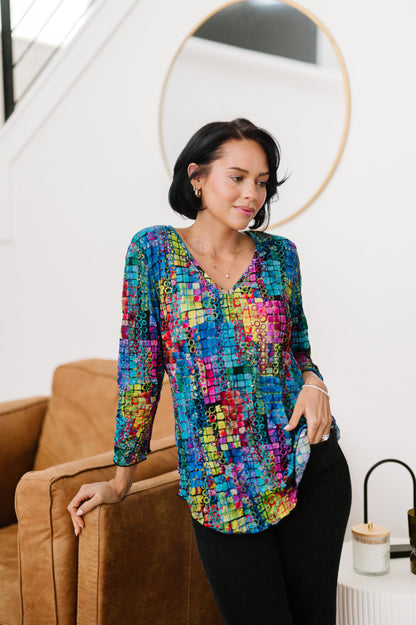 SNO SKINS Fall/Winter Collection Designer Print Crinkle V-Neck Top with Rouched Detail (Spectrum)