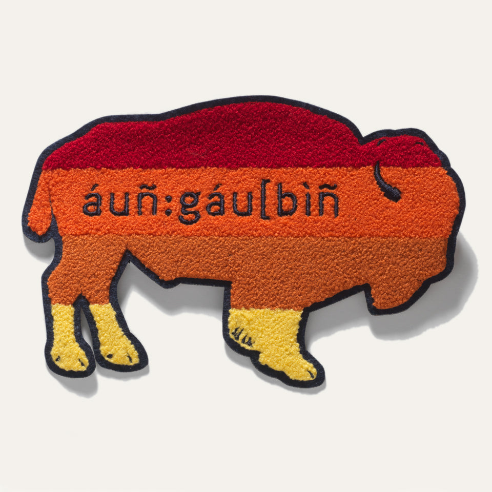 Large Steven Paul Judd designed sew-on buffalo patch in yellow orange and red.