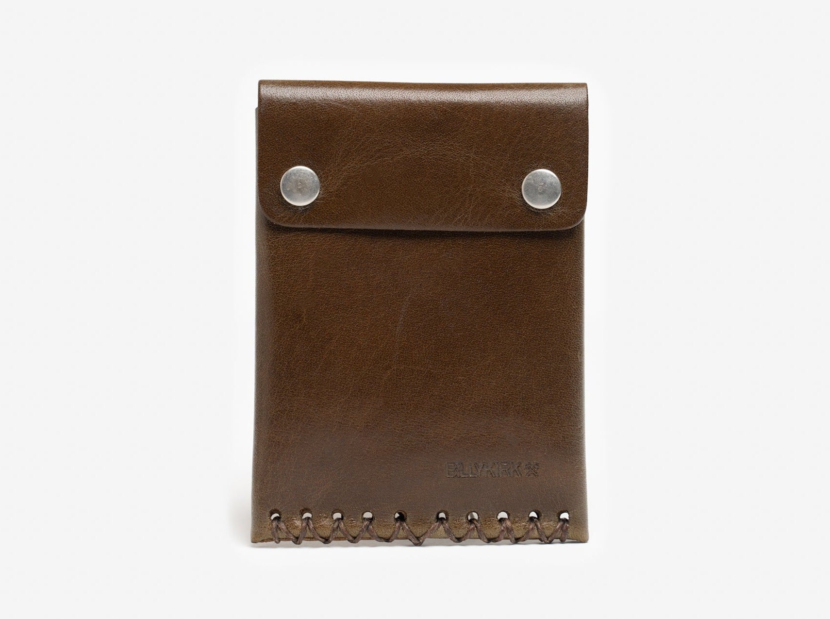 A brown leather wallet with two silver snap buttons on the flap and decorative stitching along the bottom edge, placed against a plain white background.
