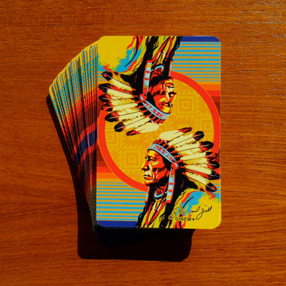 Steven Paul Judd designed Sitting Bull Playing cards slightly fanned out on wood table 