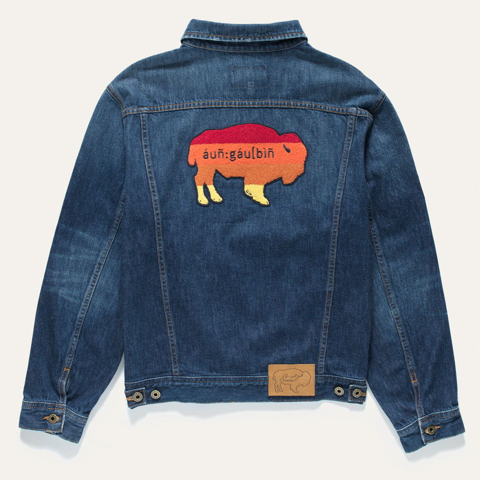 Native American designed denim jacket from Ginew + Steven Paul Judd with Buffalo patch on middle back and leather buffalo patch at waist with artist signature