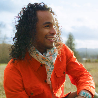 Orange wax canvas jacket with Oneida strawberry bandana from Grinew