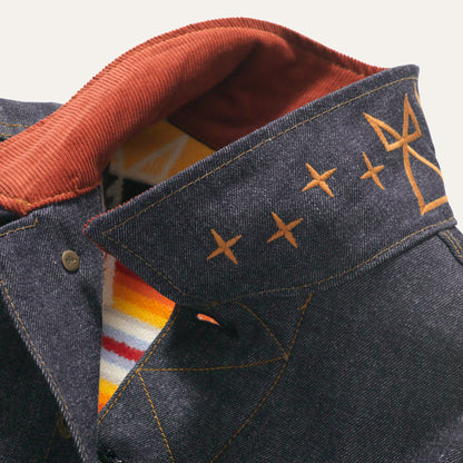 Corduroy collar with embroidery on Selvedge denim lined yellow coat with inside tag of Ginew Made in USA.