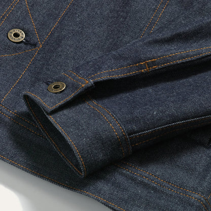 Close up of Thunderbird Jacket Vidalia Denim Cuff Sleeve with custom Ginew button.