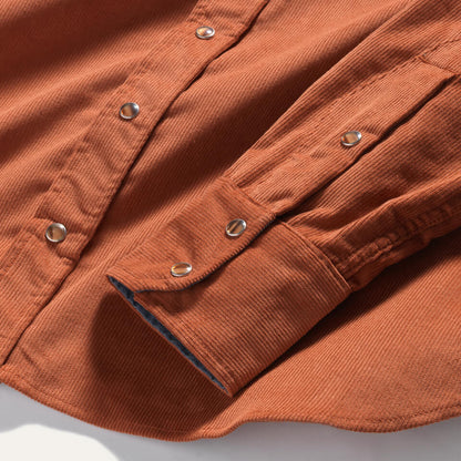 Pearl snaps on burnt orange corduroy cotton shirt