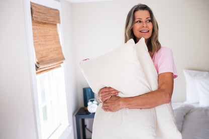 Woman Holding Pillows Bed Pillow Natural Cotton Wool Fill Made in USA