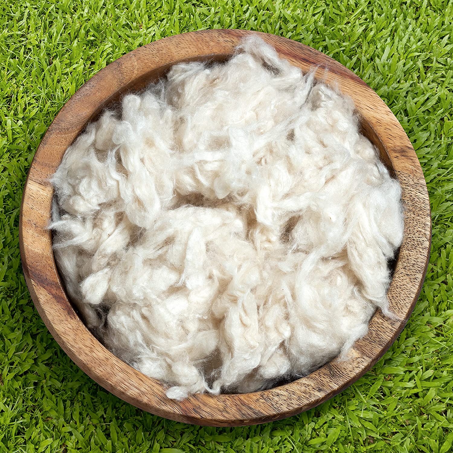 Organic kapok fiber fluffy in a bowl