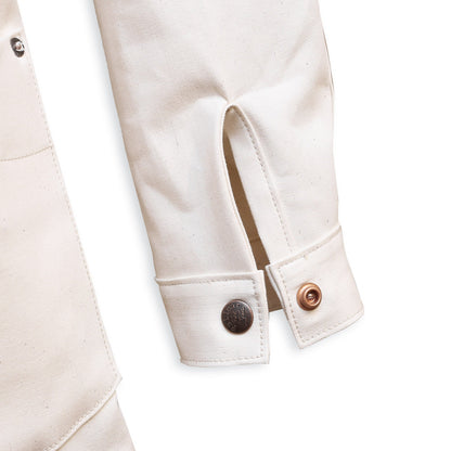 Cuff Detail of a natural seed chore coat with snap buttons